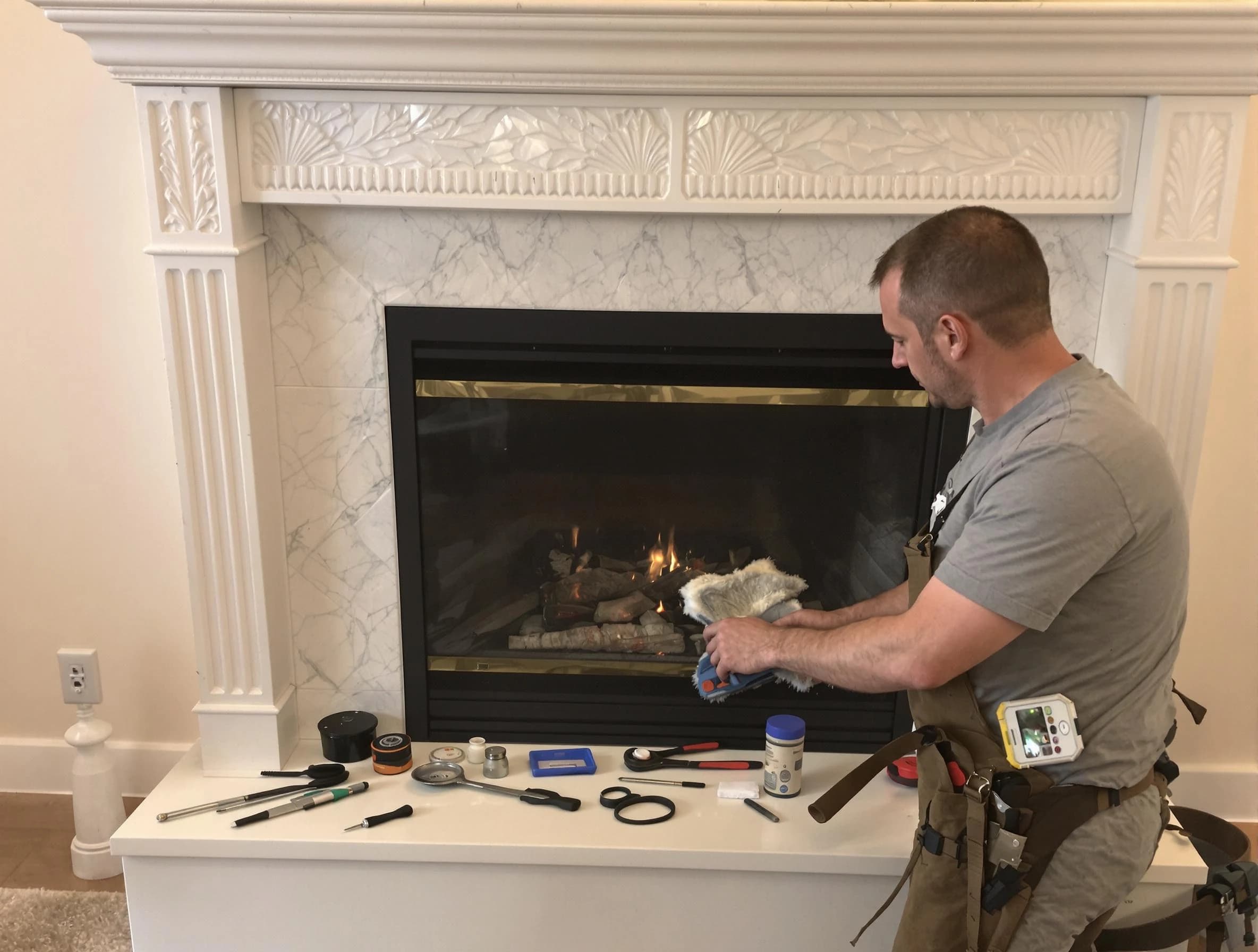 West Point Chimney Sweep performing fireplace maintenance in West Point, VA